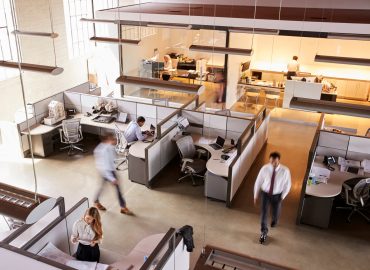 Elevated,View,Of,Staff,Working,In,A,Busy,Open,Plan